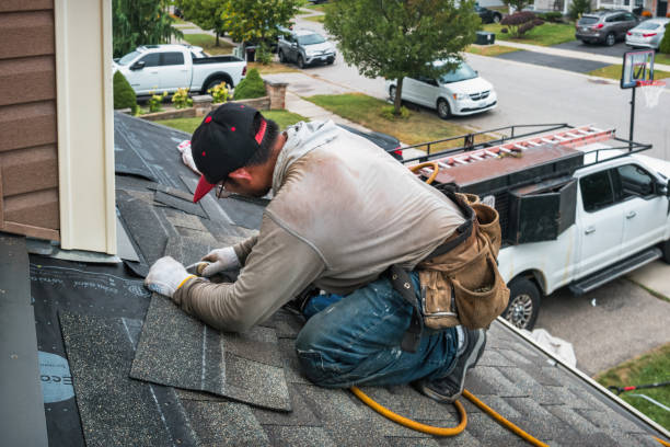 Professional Flat Roof Repair technician working in Zanesville, IN